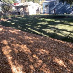 Van's Landscape - *After Landscape* Sod installation, retaining wall, dirt leveling, playground chip