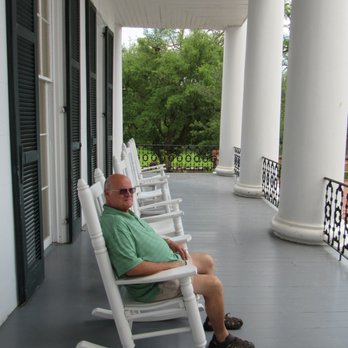 Dunleith Plantation - Tom rocking and waiting for the tour to start. - Hotels Near Me - Natchez, Mississippi Dunleith Plantation - Tom rocking and waiting for the tour to start. - Hotels Near Me - Natchez, Mississippi
