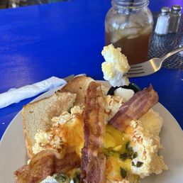 Cloudy eggs with bacon and toast