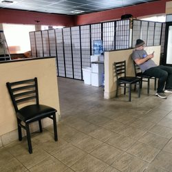 Mitori Teriyaki - My son-I sat next to. Noone else was there. She scolded me for taking pic of people without asking! She sat left chair then walked in front