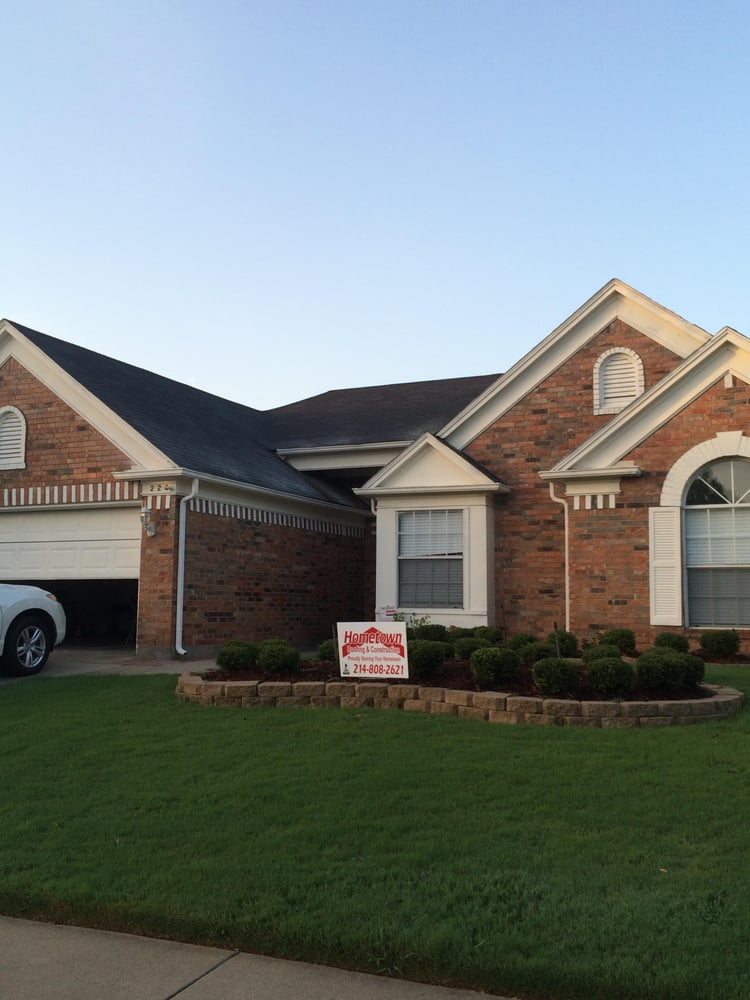 Slide of Hometown Roofing & Construction