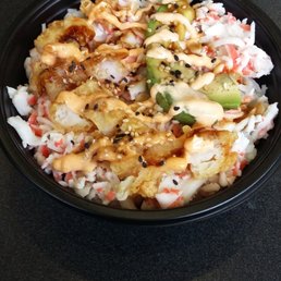 Chefs special priced at 8.99. Definitely worth it.  Sushi rice with shrimp tempura along with avocado and crab meats.  It's very filling.