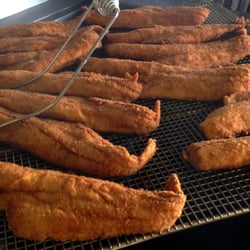 CJ's Seafoods - Golden fried haddock fillets; fresh every Friday at CJ's Seafoods on Teall Ave. in Syracuse.