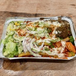 Combo with Chicken and Lamb over Spicy Rice Combo with Chicken and Lamb over Spicy Rice