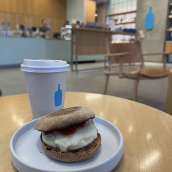 Blue Bottle Coffee - Wolf Point - Breakfast Sandwich (w/hot sauce) - Coffee & Tea Near Me - Chicago, Illinois