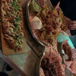 Chuck's Roadhouse Bar & Grill - Chucks appetizers (half off after 9) wings, bruschetta, nachos, spinach dip and more...