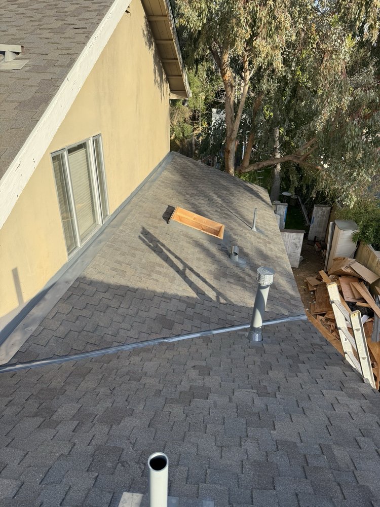 Slide of Real Bros Roofing