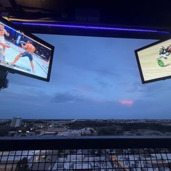 Tom’s Watch Bar - Rooftop view and screens of the games. - Sports Bars Near Me - Orlando, Florida