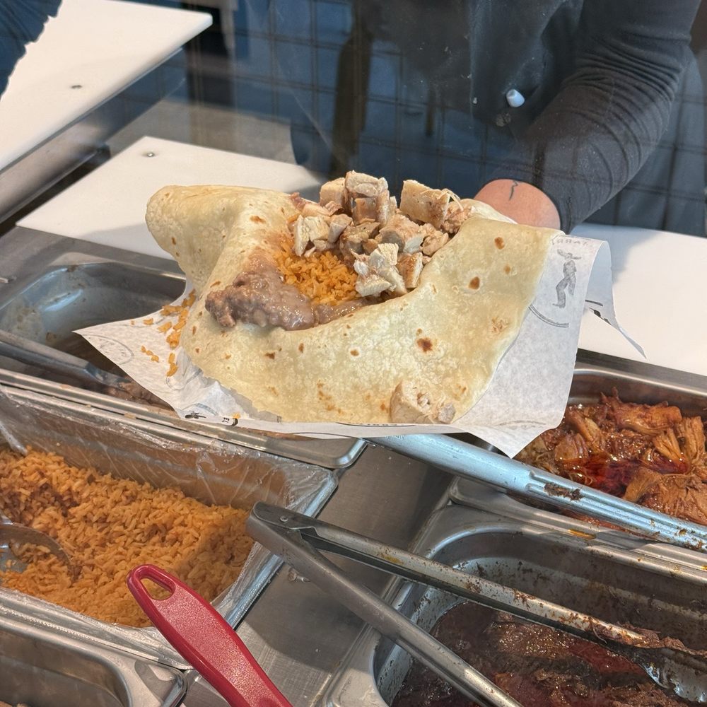 El Charrito - Filling that burrito up! - Mexican Near Me - Marina, California