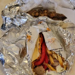 a sandwich wrapped in foil a sandwich wrapped in foil