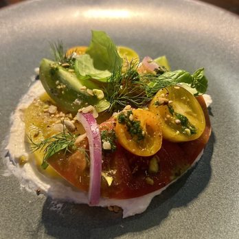 Vida - Heirloom Tomato- whipped feta, onion, pistachio dukkah, cilantro + mint chutney (comes with bread) - New American Near Me - Indianapolis, Indiana