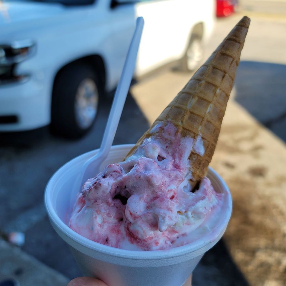 Paleteria El Oasis - a hand holding a cone of ice cream - Mexican Near Me - Arlington, Texas Paleteria El Oasis - a hand holding a cone of ice cream - Mexican Near Me - Arlington, Texas
