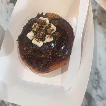 The Goods - S'mores donut: marshmallow cream filled brioche with chocolate ganache topped with graham cracker - Donuts Near Me - Carlsbad, California The Goods - S'mores donut: marshmallow cream filled brioche with chocolate ganache topped with graham cracker - Donuts Near Me - Carlsbad, California