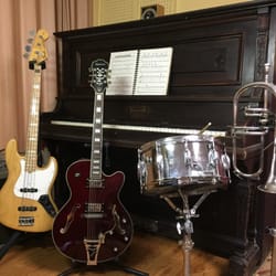 Moving Music Studio - Moving Music Studio offers instruction on guitar, electric bass, drums, trumpet and piano. All ages and abilities welcome!