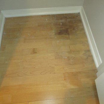 PTY Restoration - Laundry closet before the repair. Wood laminate floor was water damaged w/ apparent mold. - Damage Restoration Near Me - Los Angeles, California