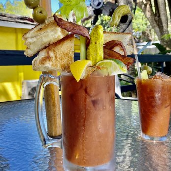 Blue Pineapple Bistro - Spicy Bloody Mary with grilled cheese, bacon, pickle, and olives. Amazing! - Cocktail Bars Near Me - Englewood, Florida Blue Pineapple Bistro - Spicy Bloody Mary with grilled cheese, bacon, pickle, and olives. Amazing! - Cocktail Bars Near Me - Englewood, Florida