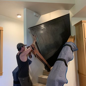 Cascadia Moving - Moving zinc wrapped Restoration Hardware CalKing bed frame. - Movers Near Me