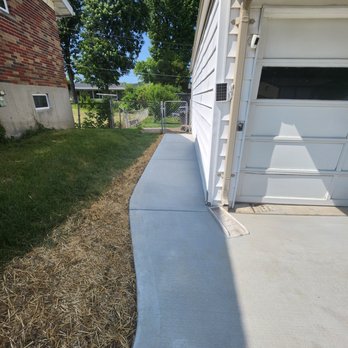 G E Elmore Contracting - Sidewalk added. They rounded it at the very foot of the driveway so it didnt look disproportionate extending past the house. - Masonry/Concrete Near Me G E Elmore Contracting - Sidewalk added. They rounded it at the very foot of the driveway so it didnt look disproportionate extending past the house. - Masonry/Concrete Near Me