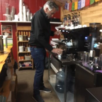 Fishtail Grind - a man working in a coffee shop - Coffee & Tea Near Me - Fishtail, Montana