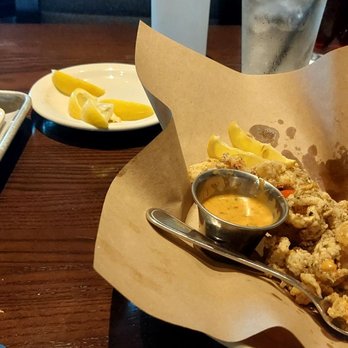 Bonefish Grill - Fresh baked bread with pesto sauce. Calamari. - Seafood Near Me - Daytona Beach, Florida Bonefish Grill - Fresh baked bread with pesto sauce. Calamari. - Seafood Near Me - Daytona Beach, Florida