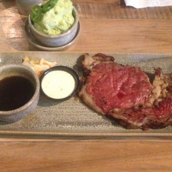 Moku Kitchen - Prime rib, medium rare, side of jalapeño mashed potatoes - Cocktail Bars Near Me - Honolulu, Hawaii Moku Kitchen - Prime rib, medium rare, side of jalapeño mashed potatoes - Cocktail Bars Near Me - Honolulu, Hawaii
