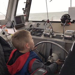 Sassy Sal Charters - Captain Andy even let my son have a try at driving!