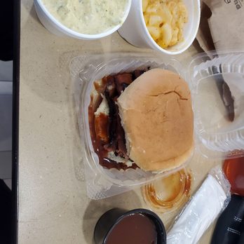 Hanks Smoked Briskets - Brisket plae with potato salad, Mac and cheese, and BBQ sauce - Barbeque Near Me - Indianapolis, Indiana