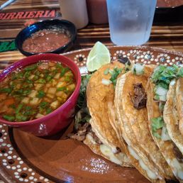 Quesobirria tacos with consomme. Quesobirria tacos with consomme.