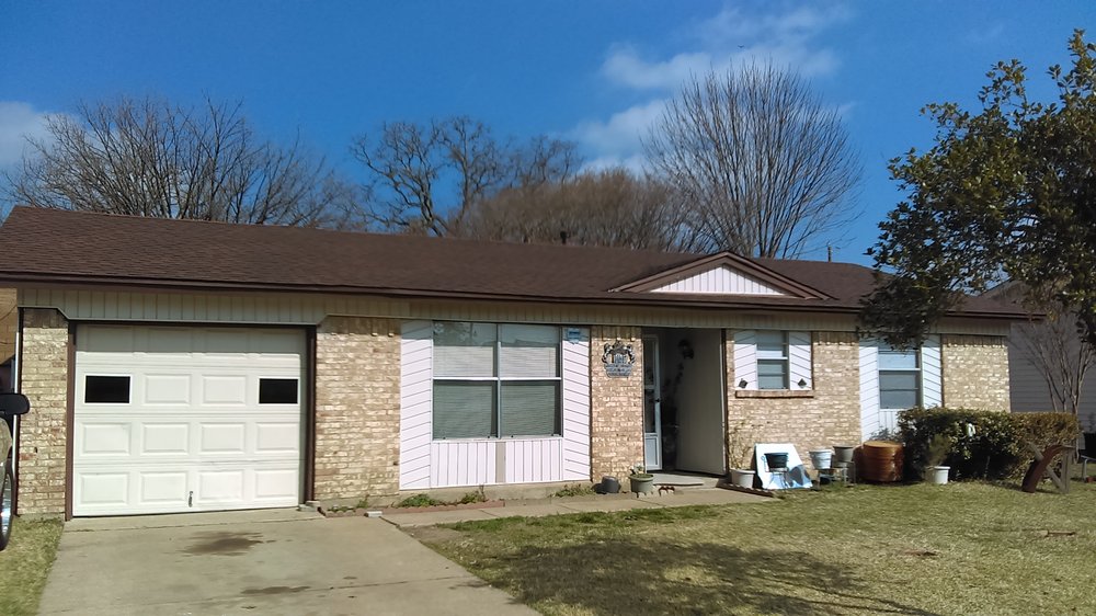 Slide of Reveles Roofing