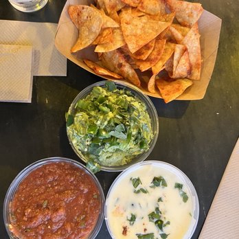 Taco Flats-Burnet Road - Pick 3 Guacamole, Queso, Salsa Roja and Chips.   Homemade chips and all sides where really good! - Mexican Near Me - Austin, Texas