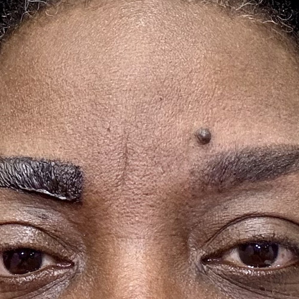 My hair is actually dark brown. The eyebrow color appears black which is a bit harsh looking on day one. My hair is actually dark brown. The eyebrow color appears black which is a bit harsh looking on day one.