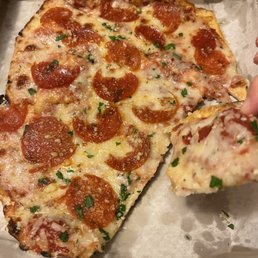 Kid's pepperoni pizza ($10.) (Started eating before I remembered to take a picture so imagine it with an extra slice!)