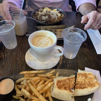 Lpcx Cafe - Cafe con leche are very generous. I had a breakfast wrap and my husband had steak breakfast, all delish! - Bakeries Near Me - Tampa, Florida