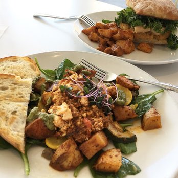 The Vault - Vegan scramble up front, the red lentil burger both from the Sunday vegan brunch menu, both yummy. - American Near Me - Tulsa, Oklahoma The Vault - Vegan scramble up front, the red lentil burger both from the Sunday vegan brunch menu, both yummy. - American Near Me - Tulsa, Oklahoma