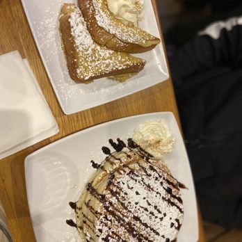 Frida Room - Classic pancakes with chocolate syrup and a side of 1/2 French Toast. - Breakfast & Brunch Near Me - Chicago, Illinois