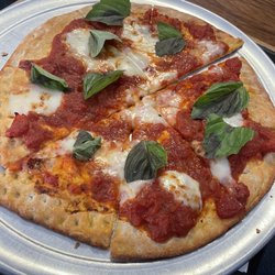 Garibaldi's Pizza - Terrible pizza that took 40+ minutes to get. "Traditional Neopolitan", my ass!  It's a disgrace to every other Margherita on the planet.