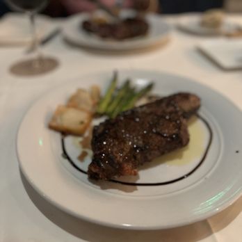 Eddie V's Prime Seafood - 18 oz USDA Prime Bone-In New York Strip with Smoked Chili Rub - Seafood Near Me - Alpharetta, Georgia Eddie V's Prime Seafood - 18 oz USDA Prime Bone-In New York Strip with Smoked Chili Rub - Seafood Near Me - Alpharetta, Georgia