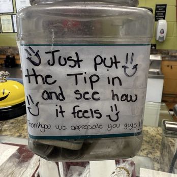 Fireside Jamaican Restaurant - Tip jar for the staff. - Caribbean Near Me - Atlanta, Georgia Fireside Jamaican Restaurant - Tip jar for the staff. - Caribbean Near Me - Atlanta, Georgia
