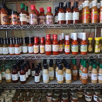 Mill Town Market - a shelf full of sauces and condiments - Bakeries Near Me - Macon, Georgia Mill Town Market - a shelf full of sauces and condiments - Bakeries Near Me - Macon, Georgia