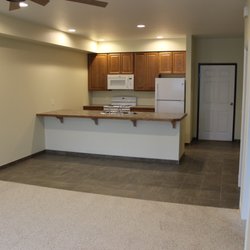 Laramie Plains Properties - Check out our newest edition! 919 Gibbon upscale 1 and 2 bedrooms with a HEATED PARKING GARAGE!