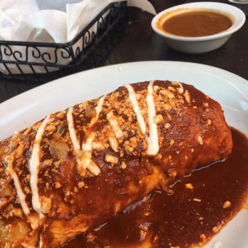 Madero 1899 - Wet burrito with mixed meat of chicken & carnitas. - Mexican Near Me - Fullerton, California Madero 1899 - Wet burrito with mixed meat of chicken & carnitas. - Mexican Near Me - Fullerton, California