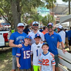 Britten Periodontics & Implant Dentistry - The Britten brothers with their sons
