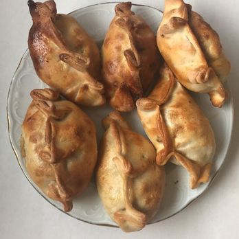 Jezabel's - Zucchini empanadas, chicken empanadas, and beef empanadas. Left to right. - Cafes Near Me - Philadelphia, Pennsylvania Jezabel's - Zucchini empanadas, chicken empanadas, and beef empanadas. Left to right. - Cafes Near Me - Philadelphia, Pennsylvania