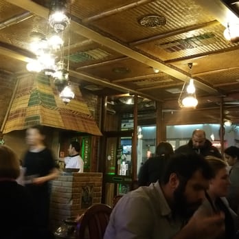Alounak - The chef making the bread in the clay oven. The restaurant maybe dated but has a charm. - Middle Eastern Near Me - London, XGL Alounak - The chef making the bread in the clay oven. The restaurant maybe dated but has a charm. - Middle Eastern Near Me - London, XGL