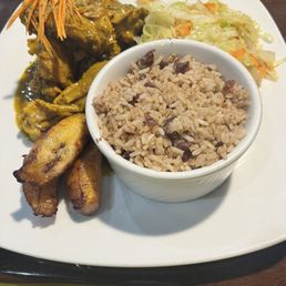 Curry Chicken, Rice and Peas, and cabbage
