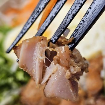 It's Pho Time - A fork holding a piece of the Glazed Pork. - Vietnamese Near Me - Roanoke, Virginia It's Pho Time - A fork holding a piece of the Glazed Pork. - Vietnamese Near Me - Roanoke, Virginia