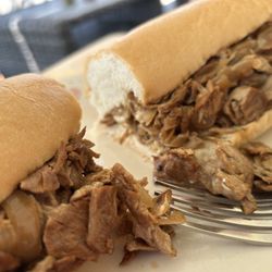 Roman's Pizza House - Vegan cheese steak with onions.