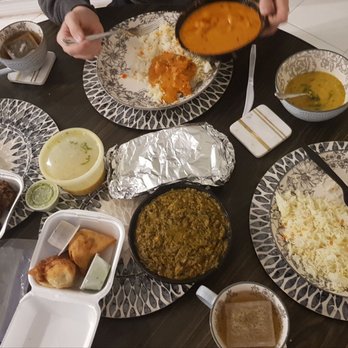 Taj Express - Saag paneer, butter chicken (both cane with big portions of rice), samosas, fried veggie balls, raitha and lentil soup - Indian Near Me - Boca Raton, Florida Taj Express - Saag paneer, butter chicken (both cane with big portions of rice), samosas, fried veggie balls, raitha and lentil soup - Indian Near Me - Boca Raton, Florida