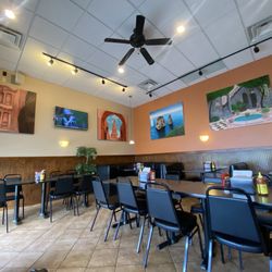 Sahara Mediterranean Food - Dining room. I like the paintings.