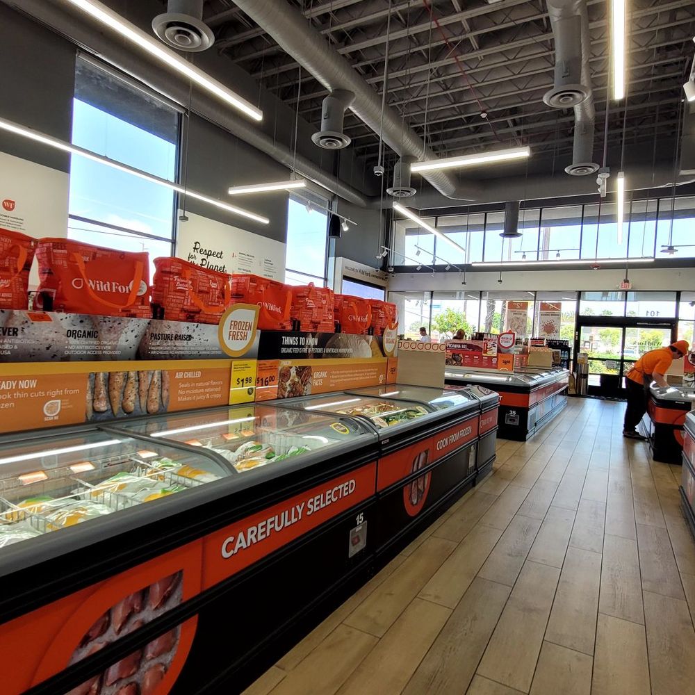 Inside the store. Neatly organized frozen meat and seafood aisles. Inside the store. Neatly organized frozen meat and seafood aisles.